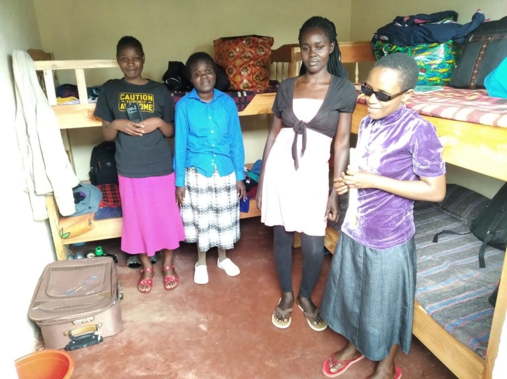 picture of four visually impaired ladies in their hostel
